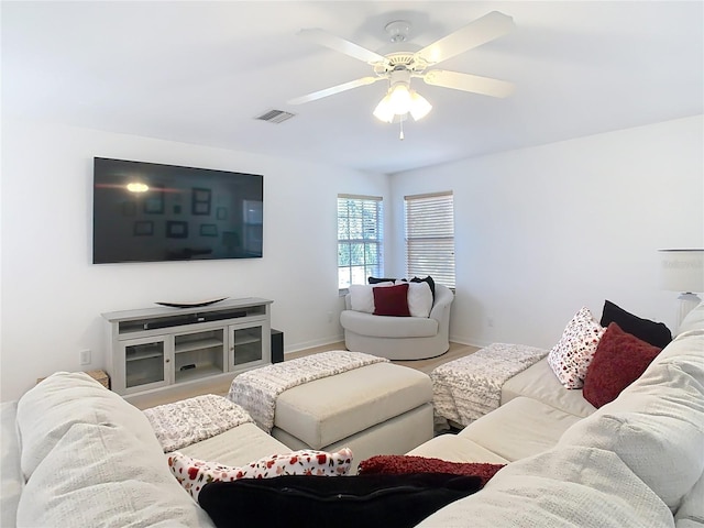 living room with ceiling fan