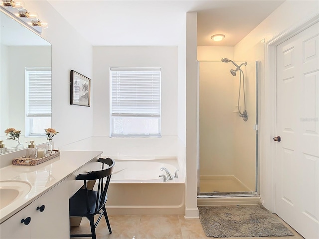 bathroom featuring vanity, tile patterned floors, and plus walk in shower