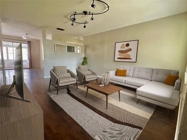 living room with dark hardwood / wood-style flooring