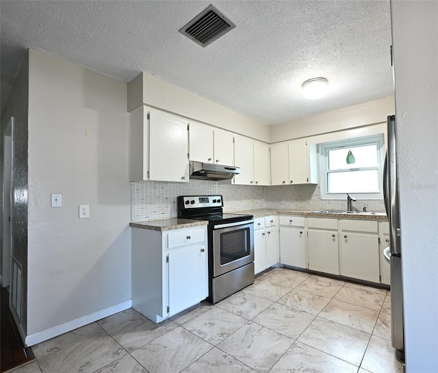 kitchen with sink, white cabinets, backsplash, stainless steel range with electric stovetop, and a textured ceiling