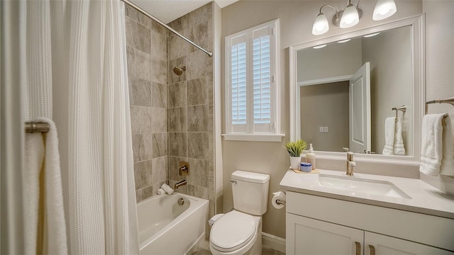 full bathroom with shower / bath combo with shower curtain, toilet, and vanity