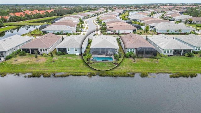 bird's eye view with a water view