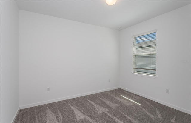 6805 SW 90th Loop, Ocala, FL 34476 - carpeted spare room with baseboards