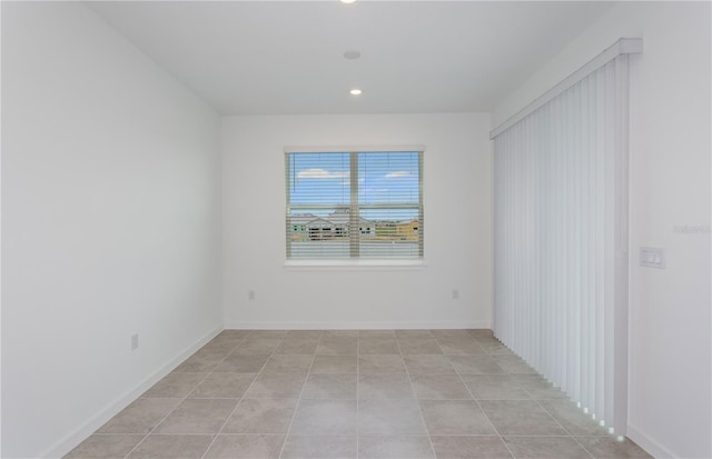 6805 SW 90th Loop, Ocala, FL 34476 - unfurnished room featuring light tile patterned floors, baseboards, and recessed lighting