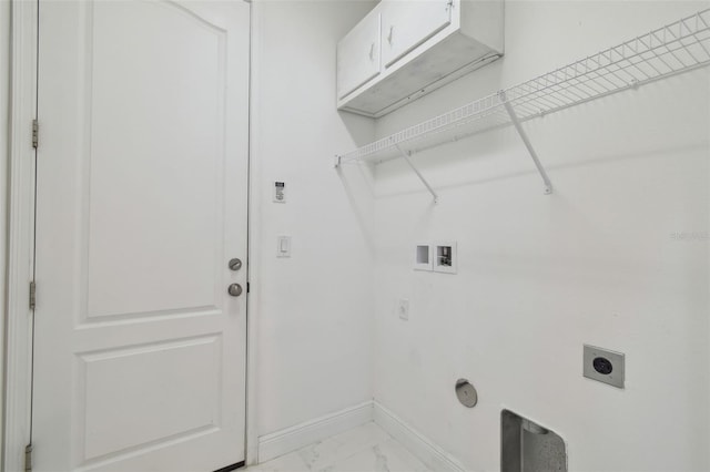 laundry area with hookup for a washing machine, cabinets, and hookup for an electric dryer