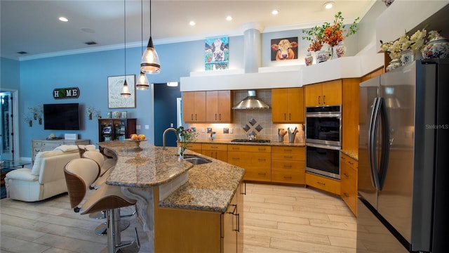 kitchen featuring pendant lighting, sink, stainless steel appliances, tasteful backsplash, and ornamental molding