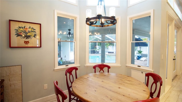 dining space with a chandelier