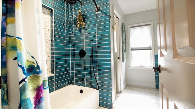 bathroom featuring shower / tub combo