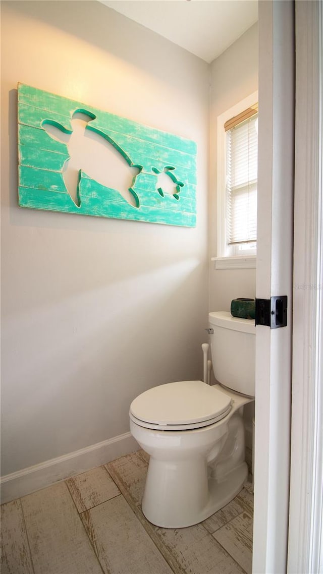 bathroom featuring tile patterned floors and toilet