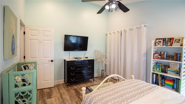 bedroom featuring ceiling fan and dark hardwood / wood-style floors