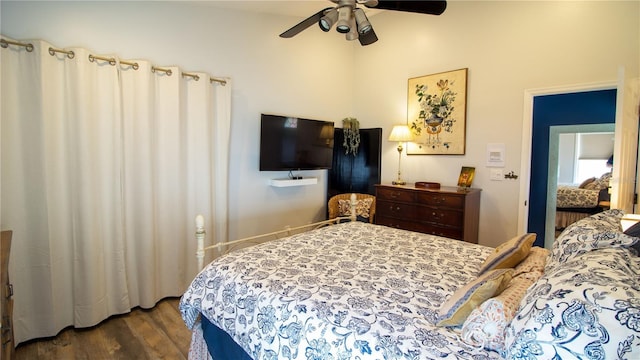 bedroom featuring dark wood-type flooring and ceiling fan