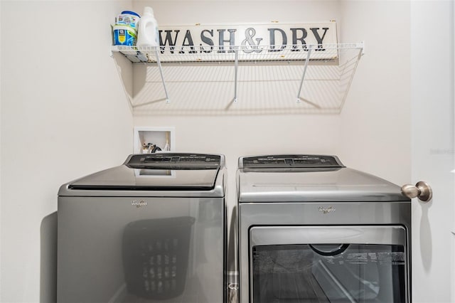 laundry room featuring independent washer and dryer