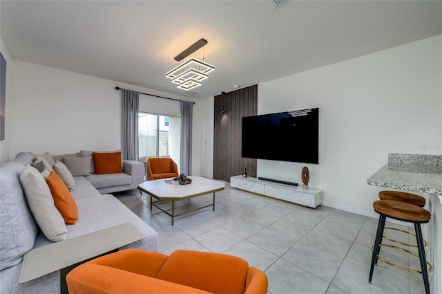 living room featuring light tile patterned floors