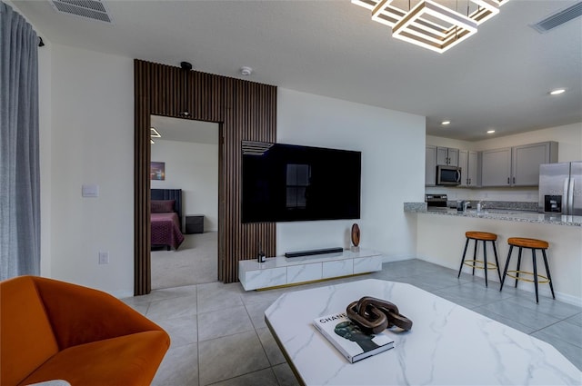 living room featuring light tile patterned floors