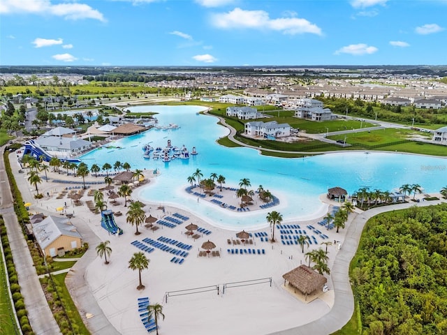 birds eye view of property featuring a water view