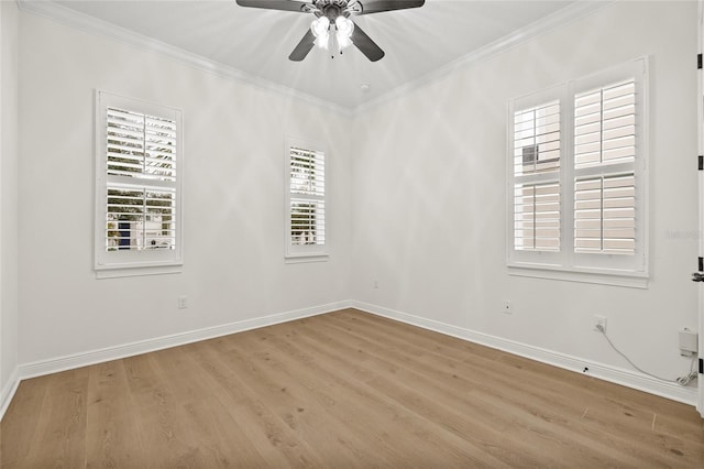 spare room featuring ceiling fan, light hardwood / wood-style flooring, and ornamental molding