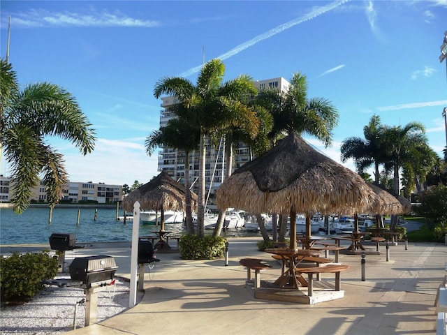 view of community featuring a water view and a gazebo