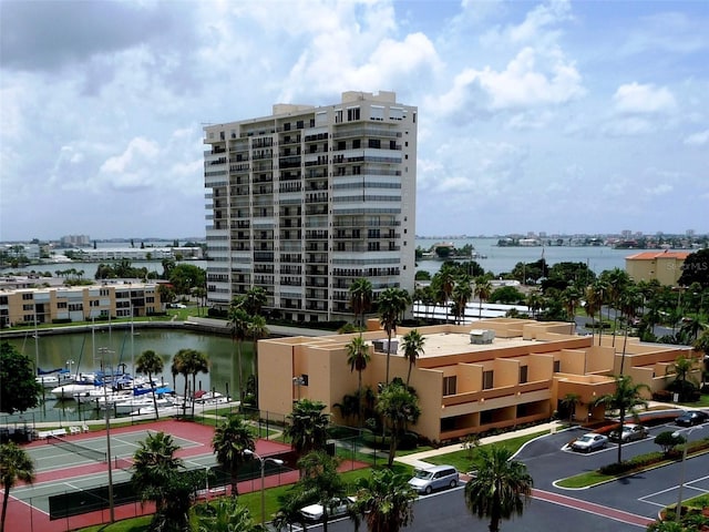 view of building exterior with a water view