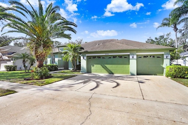 ranch-style house featuring a garage