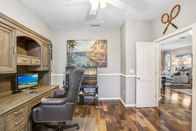 office space featuring dark wood-type flooring and ceiling fan