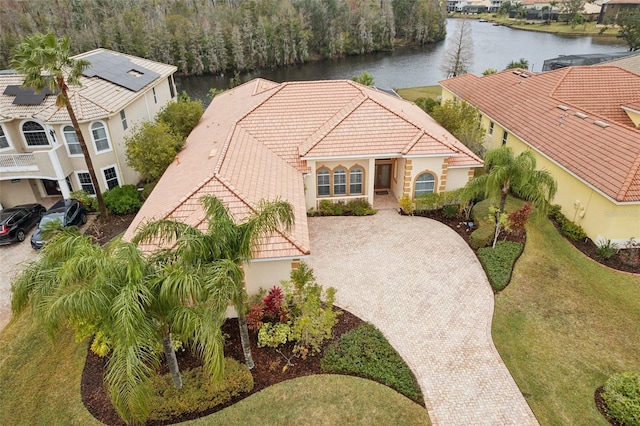 birds eye view of property featuring a water view