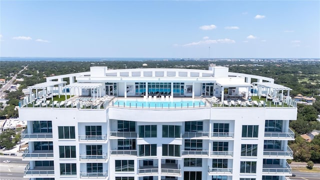 view of property featuring a community pool