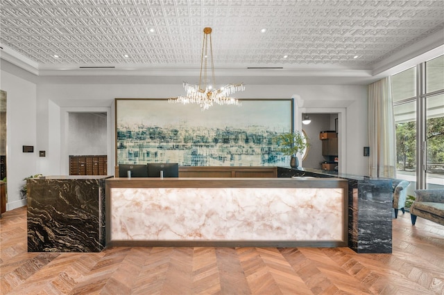 reception area with an inviting chandelier