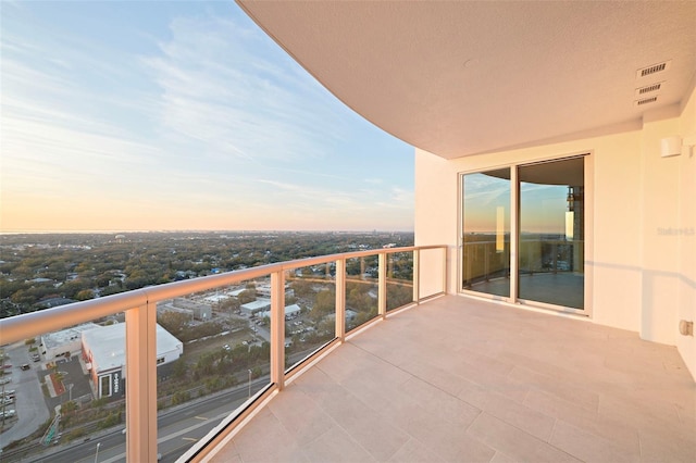 balcony featuring a sunroom