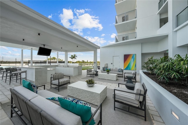 view of patio / terrace with outdoor dry bar and outdoor lounge area