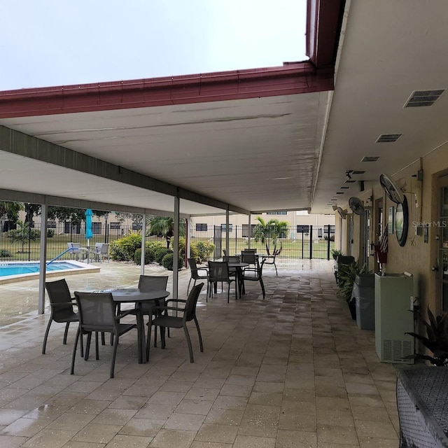 view of patio with a community pool