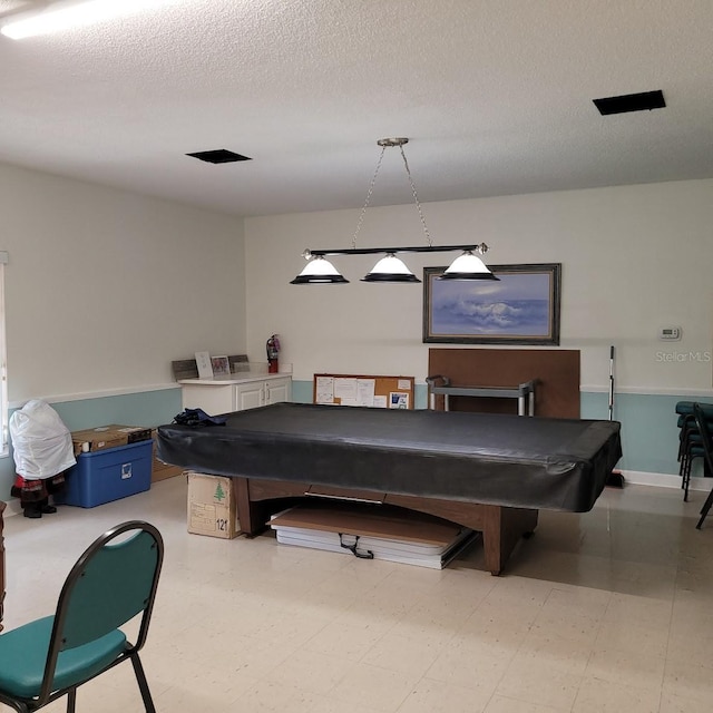 recreation room featuring a textured ceiling and billiards