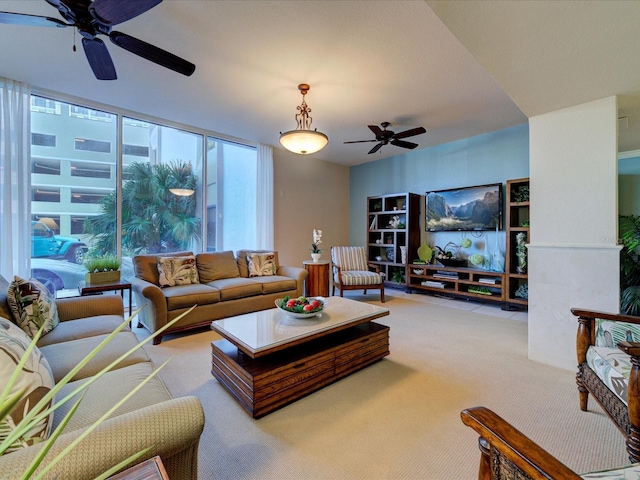 living room featuring light carpet and ceiling fan