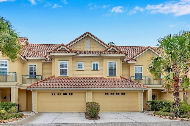 view of front of house with a balcony and a garage