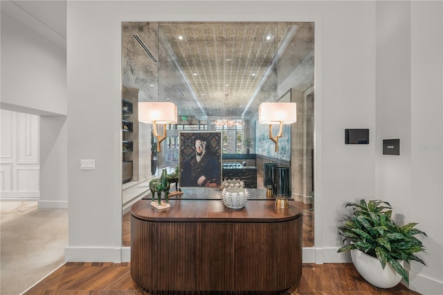 home office with hardwood / wood-style floors