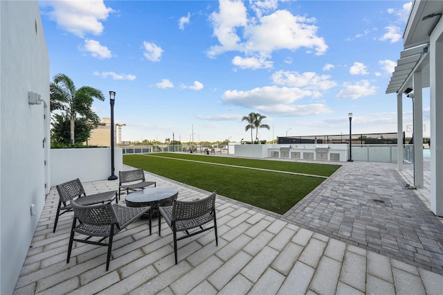 view of patio / terrace featuring exterior kitchen