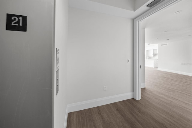 hall featuring wood-type flooring