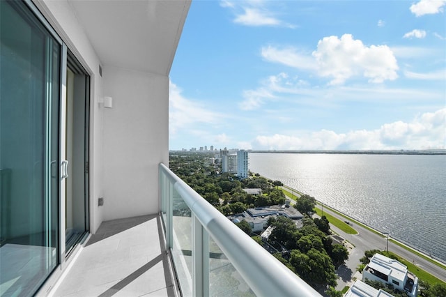 balcony featuring a water view