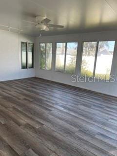 interior space featuring ceiling fan