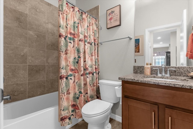 full bathroom featuring shower / bath combo, toilet, and vanity