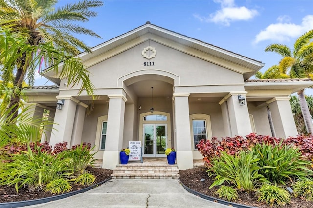 view of exterior entry with french doors