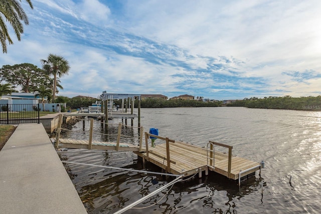 dock area featuring a water view