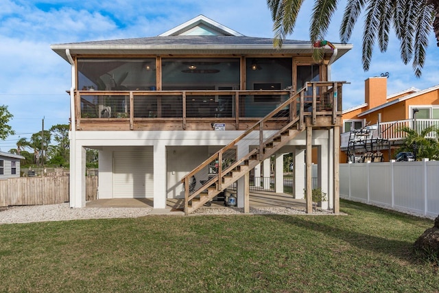 back of house featuring a yard