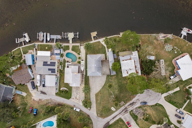 drone / aerial view with a water view