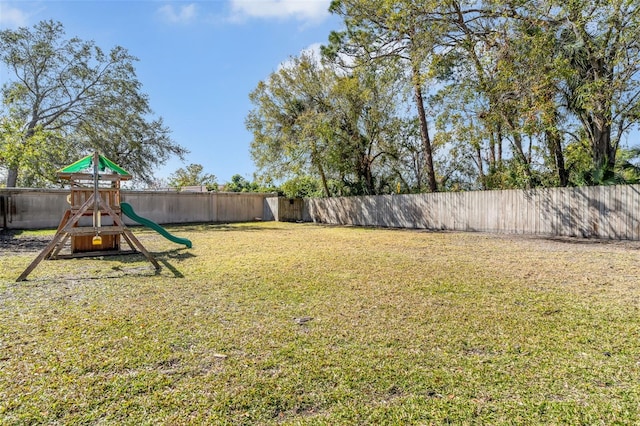 view of yard with a playground