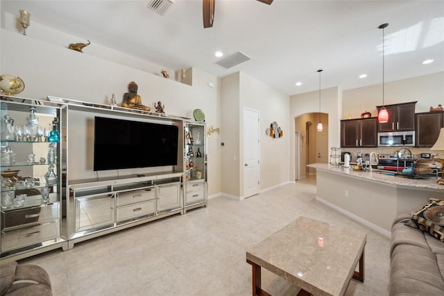 living room with ceiling fan