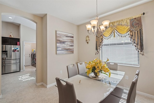 dining room featuring a chandelier