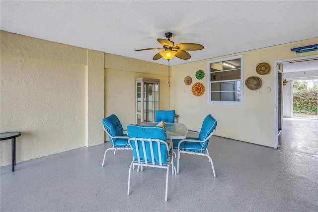 view of patio with ceiling fan