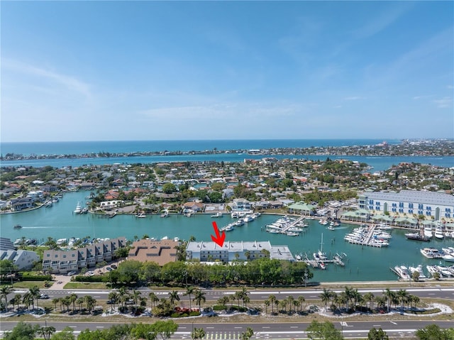 birds eye view of property featuring a water view