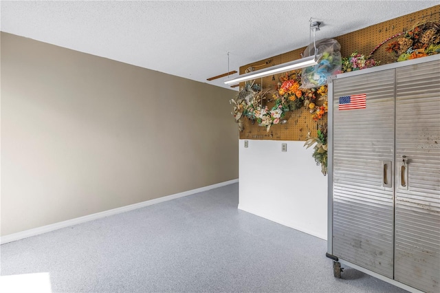 340 Pinellas Bayway S Unit 306, Tierra Verde, FL 33715 - garage with baseboards