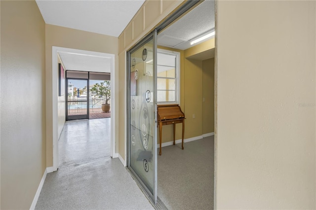 340 Pinellas Bayway S Unit 306, Tierra Verde, FL 33715 - hall with baseboards